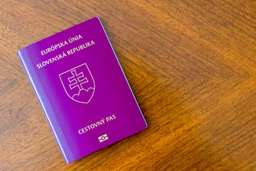 Slovak purple passport on a wooden table
