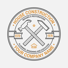 House construction company identity with crossed hammers. Vector illustration. Thin line badge, sign for real estate, building and construction company related business.