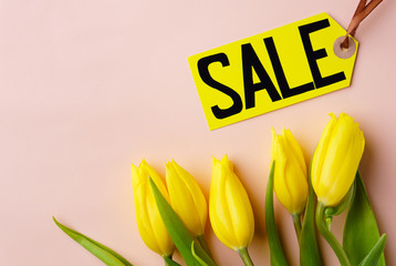 mothers day, valentine, women day, spring holidays seasonal sale, shopping, love. special offer, discount symbol. price tag and yellow tulips on pastel background, shopping banner template