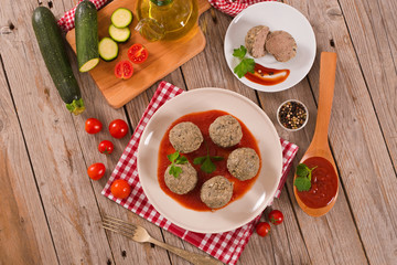 Fototapeta na wymiar Meatballs with tomato sauce.