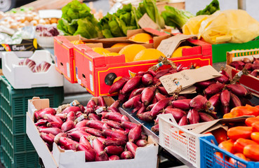 Various colorful fresh vegetables in the fruit market, Catania, Sicily, Italy.