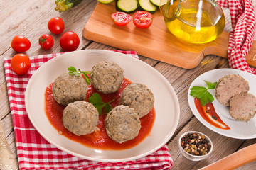 Meatballs with tomato sauce.
