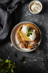 shortcrust pie with raspberry and a ball of ice cream