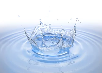  Clear water crown splash in water pool with ripples. © matis75