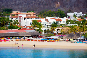 Huatulco, Mexico, beach.   Huatulco Bay is a picturesque Paradise with amazing mountains, slopes, valleys and abundant vegetation, magnificent beaches.