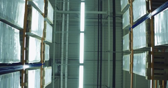 Lighting ceiling in modern blue yellow warehouse.