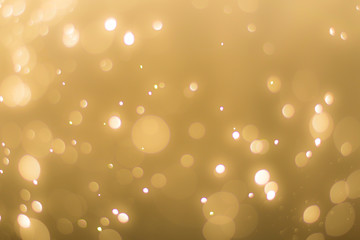abstractr Gold background with blur bokeh light effect