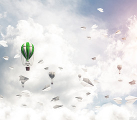 Flying hot air balloons in the air.