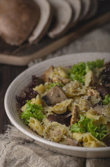 Homemade tortellini with mushrooms and walnuts
