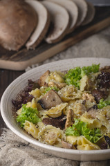 Homemade tortellini with mushrooms and walnuts