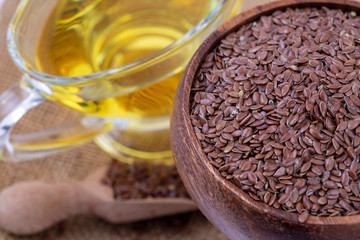 Flax seeds and oil isolated on white background