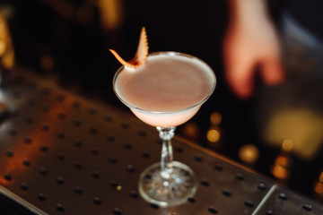 Cocktail Preparation. The barman is preparing a drink.