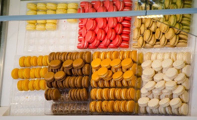 Top view of Colorful small circular biscuit Macaron display in a pastry shop.