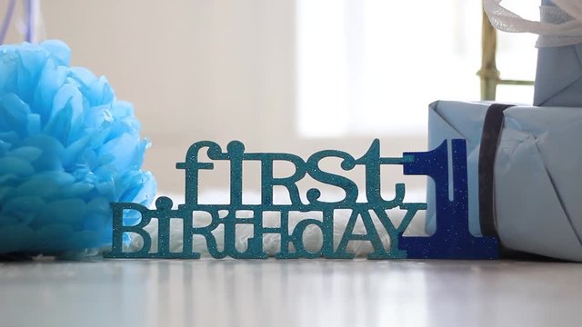 Inscription to the birthday of 1 year with decorations.