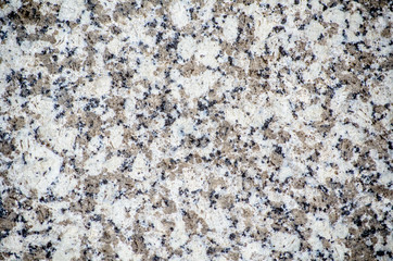 Grey concrete in abstract pattern on surface flooring.