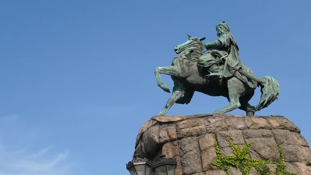Hetman Bohdan Khmelnytsky Monument against the blue sky. Orbit panoramic shot