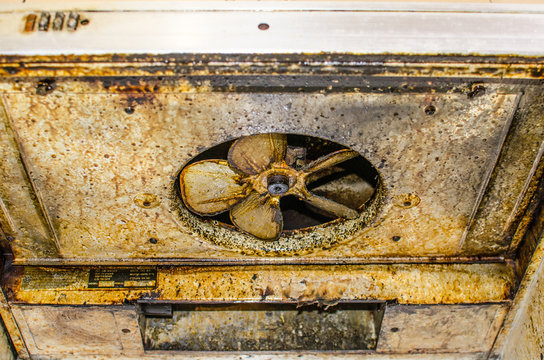 Dirty And Greasy Exhaust Fan Kitchen Hood.