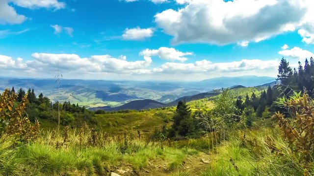 Picturesque landscape of Carpathian mountains in early autumn. View from mount Pikui (1405m), Carpathians, Ukraine. Time Lapse