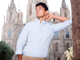 man posing in gothic quarter of Barcelona