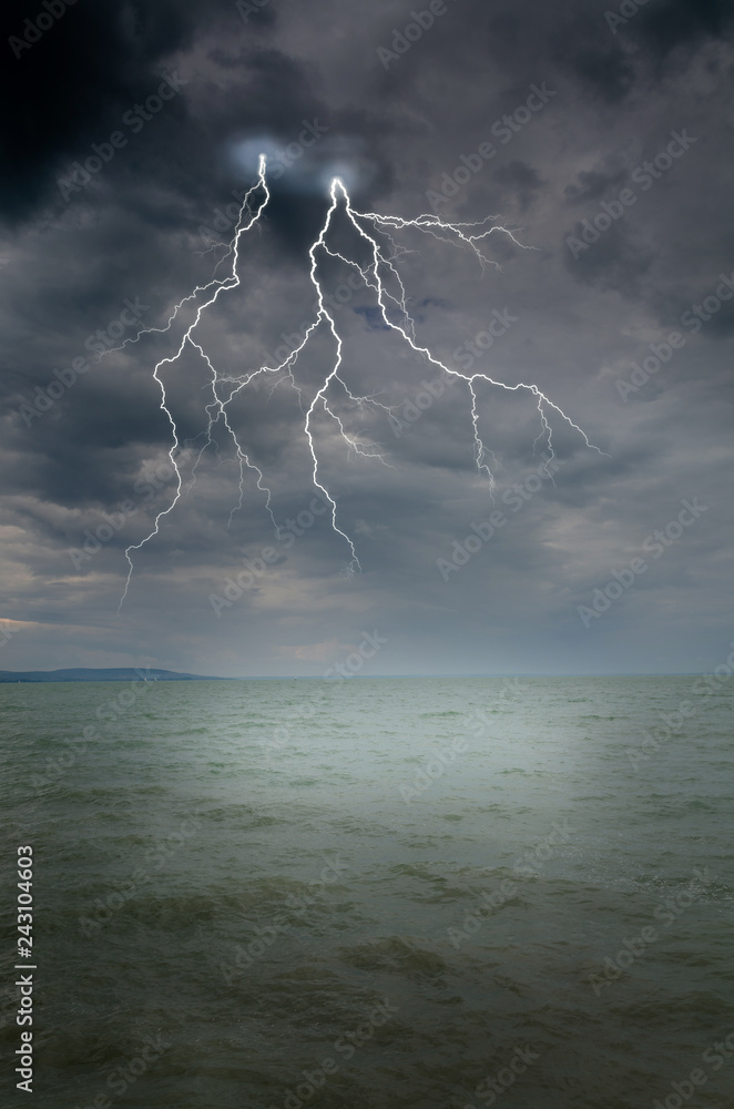 Wall mural thunderstorm in dramatic sky