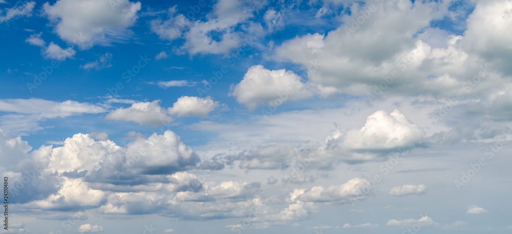 Wall mural blue sky with clouds