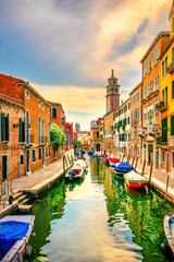 Venice rio San Barnaba cityscape, water canal, church and boats. Italy