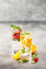 Summer drinks with strawberry and orange
