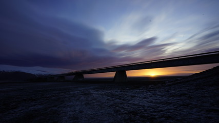 sunrise among a bridge in iceland