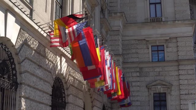 Flags of the OSCE participating States on the headquarters building in Vienna