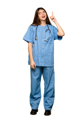 Full-length shot of Young nurse intending to realizes the solution while lifting a finger up on isolated white background