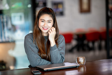 Beautiful Attractive Business Asian woman with laptop smile and have positive emotional feeling so happiness,Business Startup Concept