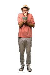 Man holding many bills keeps palm together. Person asks for something on isolated white background