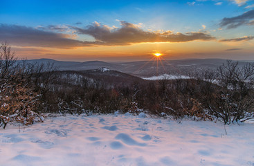 Hills covered by white snow in winter