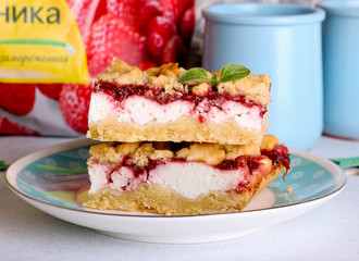 Stack of cake or cookies with plum, strawberry, raspberry and cherry jam or marmalade with sweet crumbs, cinnamon and nuts