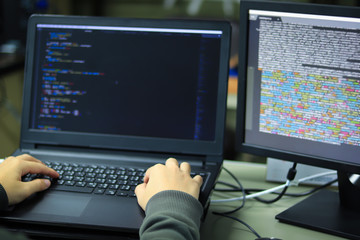Developing programming technology and coding website design to be a data center. Programmers who are writing programs for the company to create a database for the business.