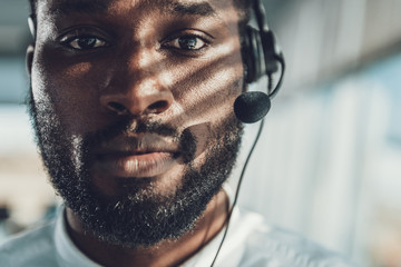 Front view portrait of operator man with headset