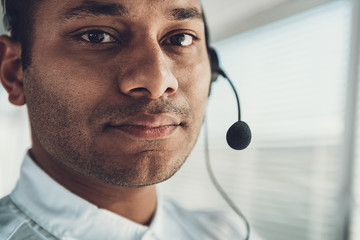 Close up portrait of operator man with headset