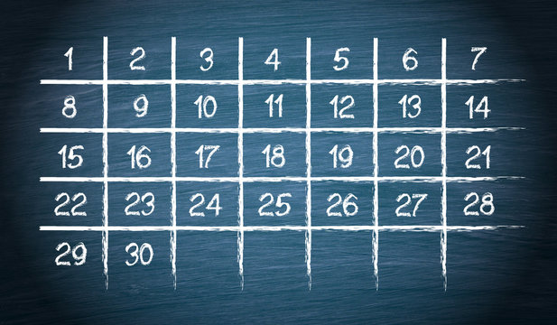 Monthly calendar with 30 days on blue chalkboard background