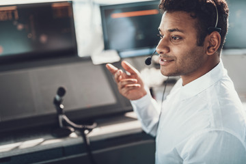 Air dispatch man connecting by headset microphone