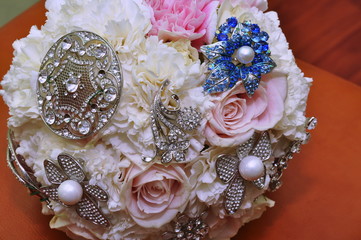 bridal bouquet, roses, carnations and jewelry