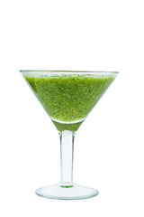 Cocktail glass of homemade spinach and broccoli smoothie smoothie isolated on white background