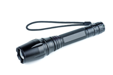 Black LED flashlight isolated on white background