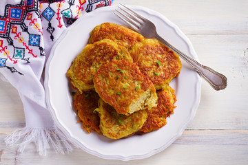 Potato pancakes. Vegetable fritters, latkes, draniki - popular dish in many countries