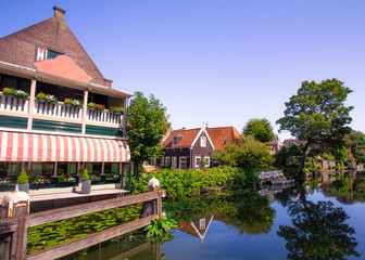 Scene from picturesque cheese-making town of Edam, Holland with historic architecture and canal