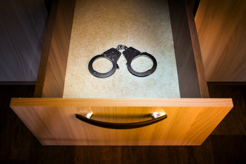 Handcuffs in the Drawer