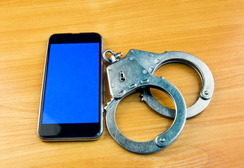 Phone and Handcuffs