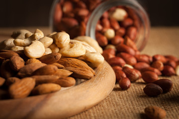 mix of nuts on a wooden table