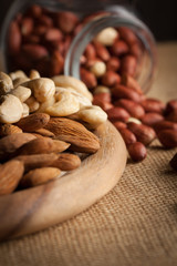 mix of nuts on a wooden table