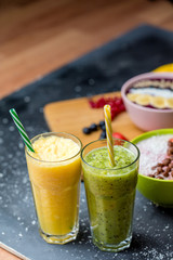 colorful homemade milkshakes with manu vitamins. close up photo