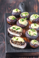 Baked mushrooms stuffed with mozzarella